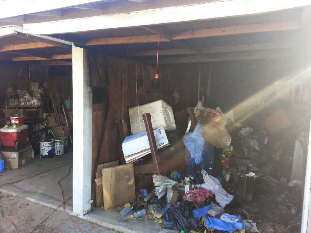Before: Roof hole from fire damage requiring tarping and board-up in Hesperia