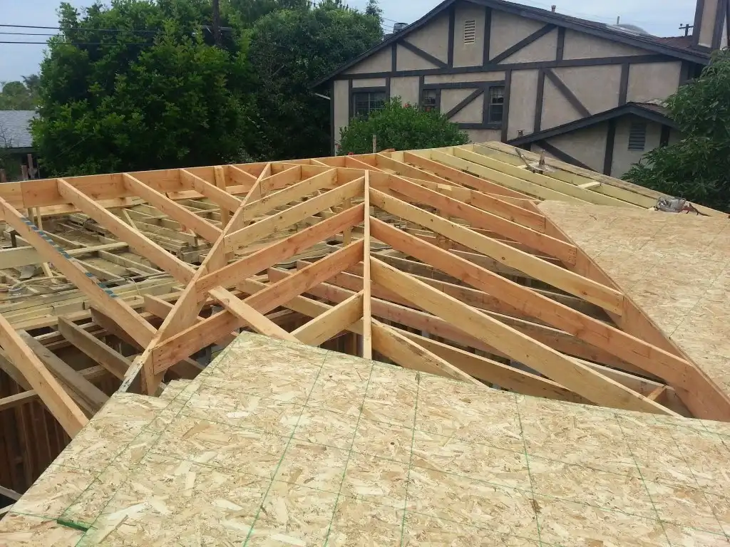 Before: New truss framing and OSB roof sheathing during fire damage rebuild in Orange County
