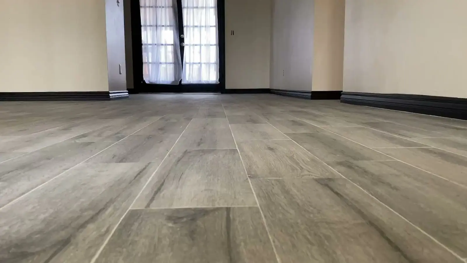Finished flooring and baseboards: San Jacinto slab leak packout flooring baseboard and paint repair documented with finished flooring and vanity video stills